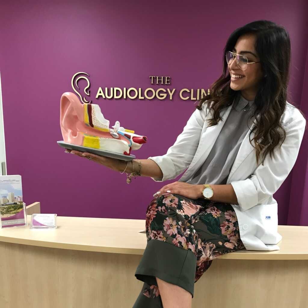 Audiologist giving advice on maintaining healthy hearing