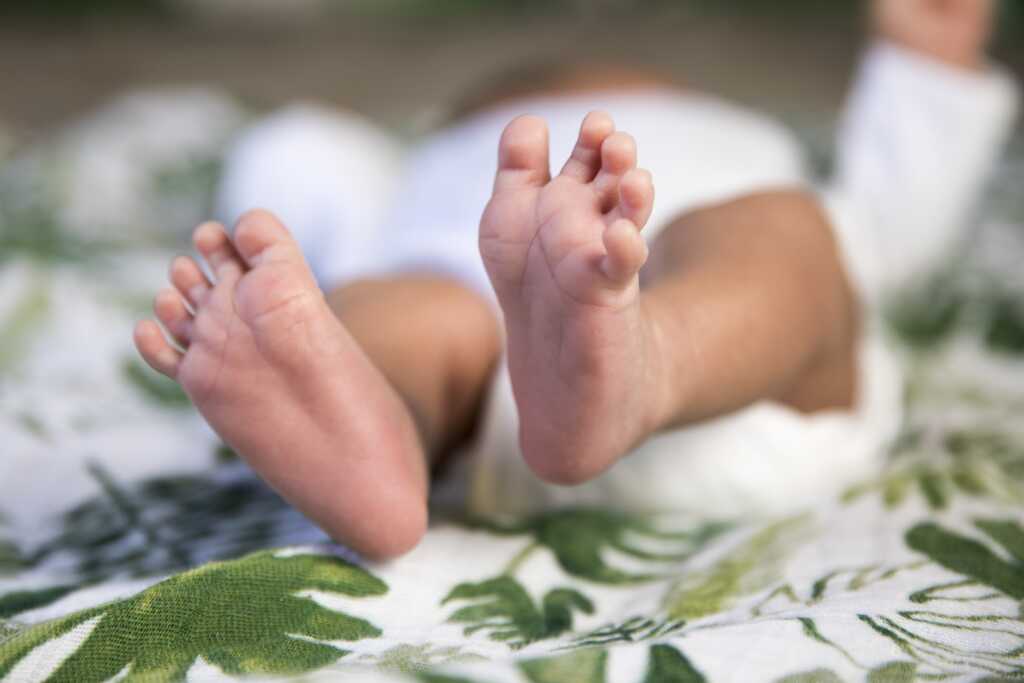 Baby feet on blanket 